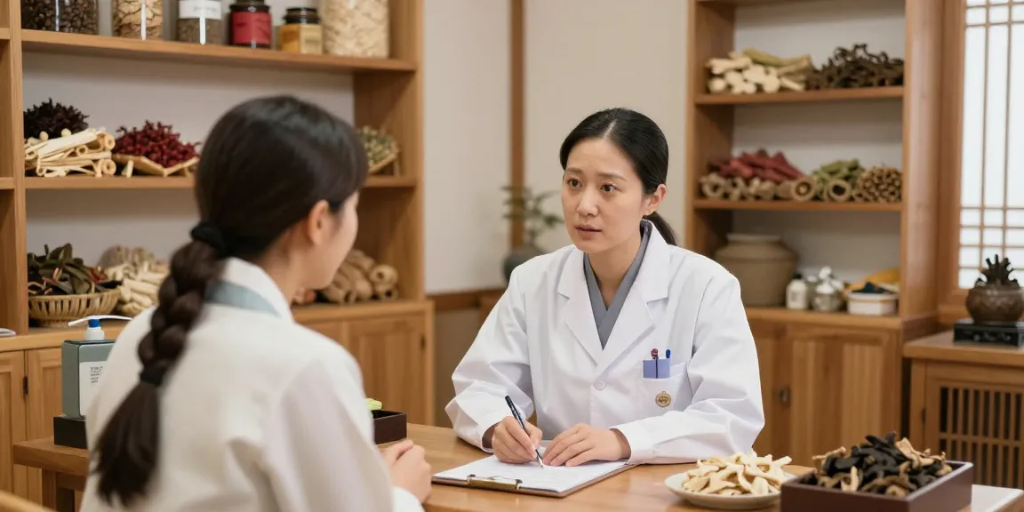 Consultation at 수원한의원 with a herbalist discussing personalized treatment options in a serene clinic setting.